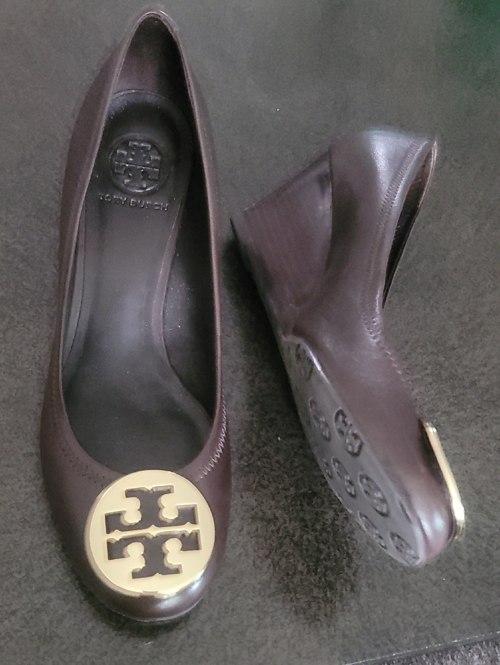 Tory Burch Dark Brown Leather Wedge Pumps with Gold Logo Medallion
